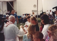 Museum father mac baptizes.jpg