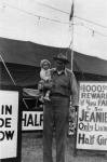  Al Tomaini Holding Daughter Judy In Front of Jeanie Tomaini Sign